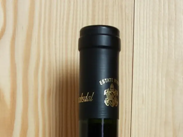 In this picture we can see a bottle on a platform.